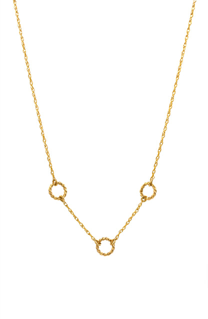 Gold necklace with small circular pendants on a white background