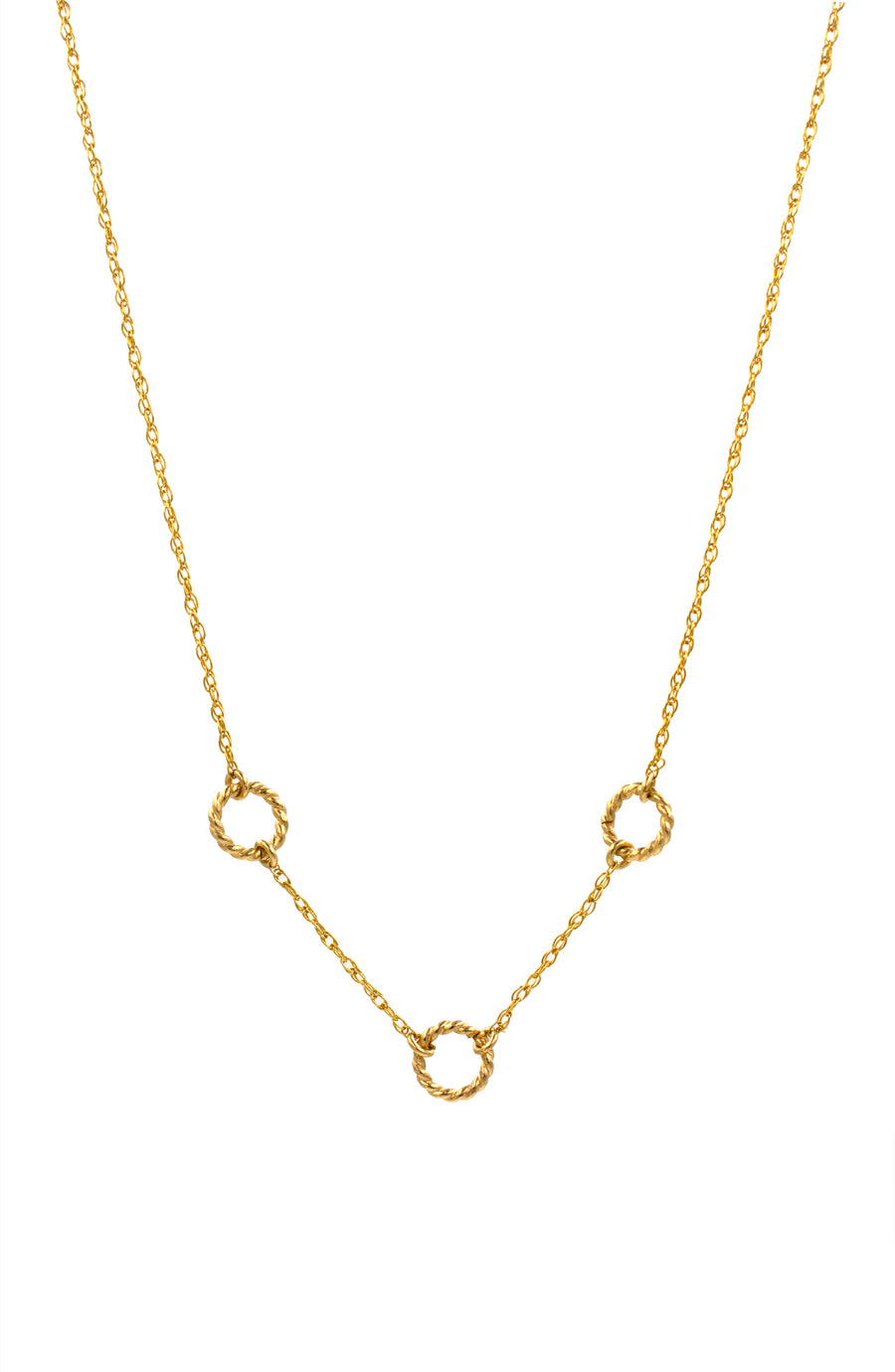 Gold necklace with small circular pendants on a white background